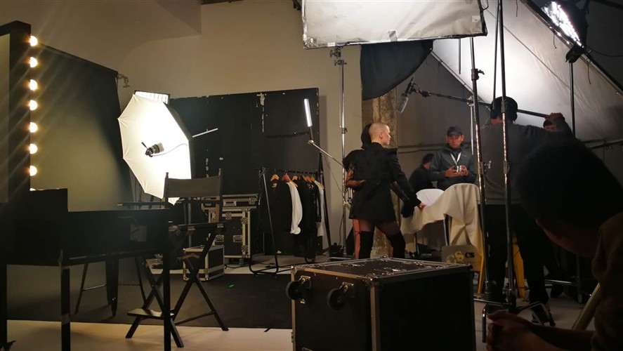 Beijing Camera Crew working on a studio set with lighting and grip equipment